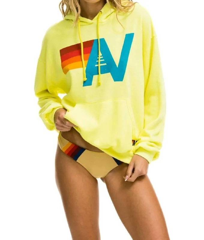 Effortless Style, Endless Impact Logo Pullover Relaxed Hoodie In Neon Yellow